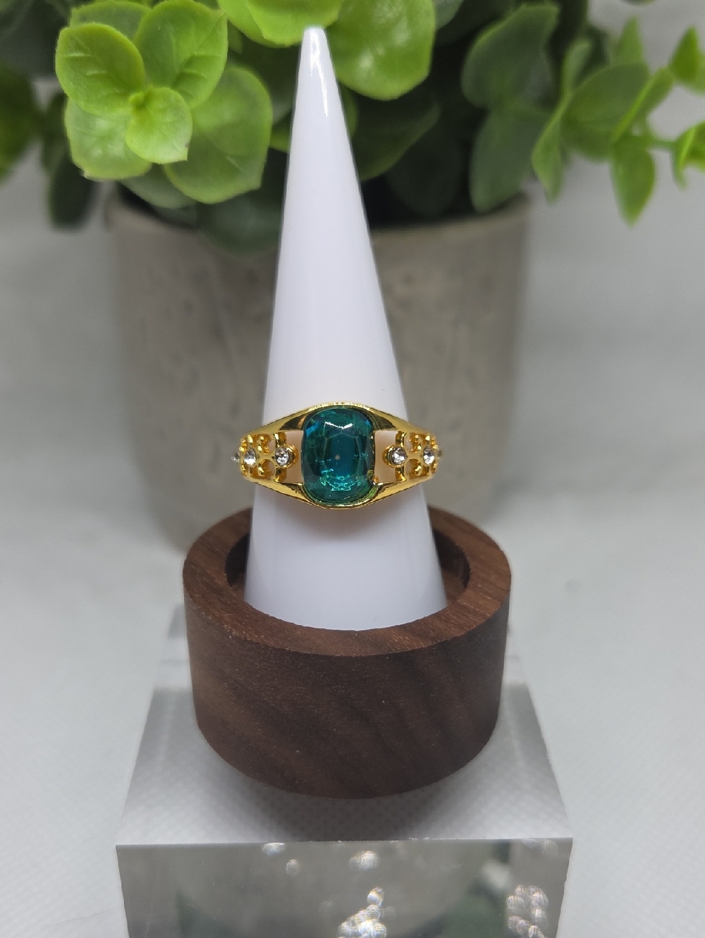 Gold Ring with Teal Cushion Center and Accent Stones